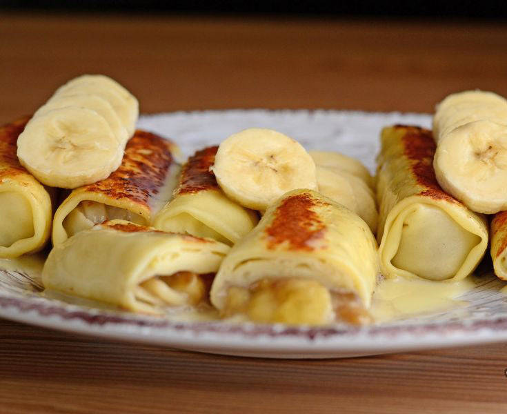 Млинці з бананами і згущеним молоком