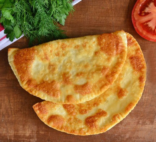 Чебуреки со свининой, творогом и помидорами